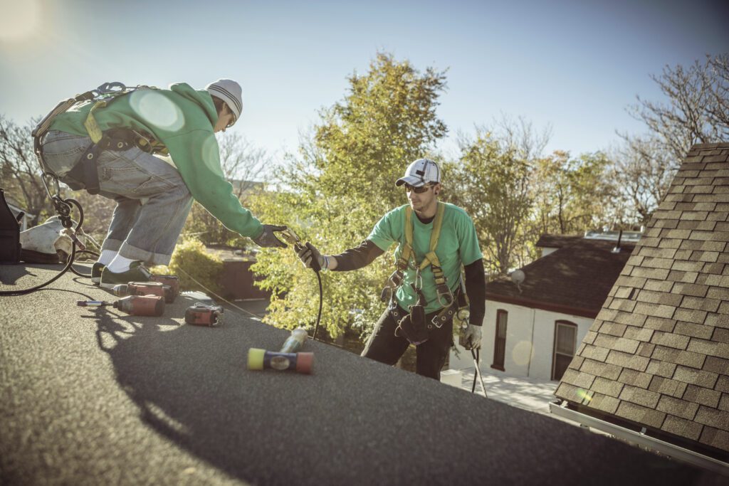 roofers installing residential roofing