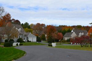 A typical middle class home in a neighborhood - real estate housing market autumn fall season